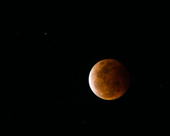 Scenic view of moon against sky at night