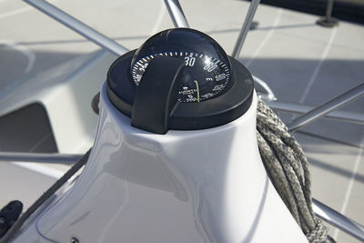 Close up of an orienteering compass on a sailing yacht