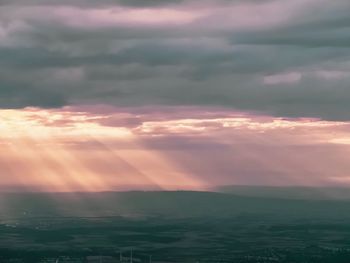 Scenic view of dramatic sky during sunset