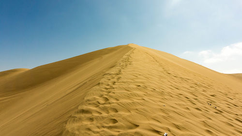 Scenic view of desert against sky