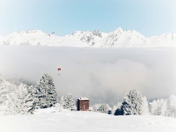 Scenic view of snowcapped mountains against sky