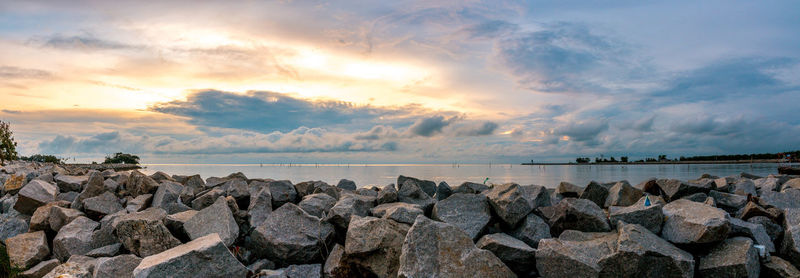 Panoramic view of sea against sky during sunset