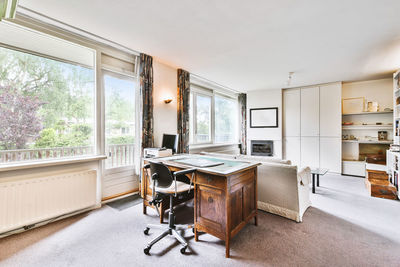 Chairs and tables in room at home