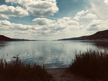 Scenic view of lake against sky