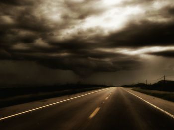 View of road against cloudy sky