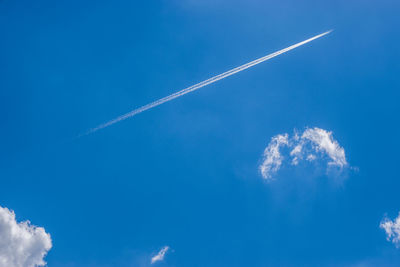 Low angle view of vapor trail in sky