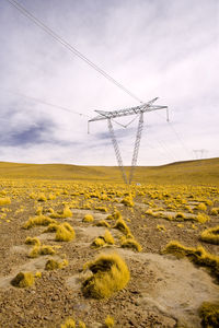 Power lines towers in the altiplano at 4200 meters over the sea level, atacama desert, chile