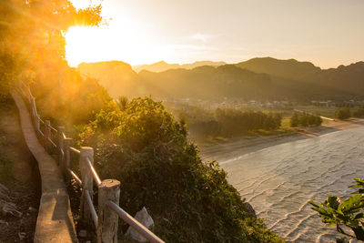 Scenic view of landscape against sky during sunset