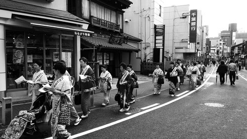 People walking on city street