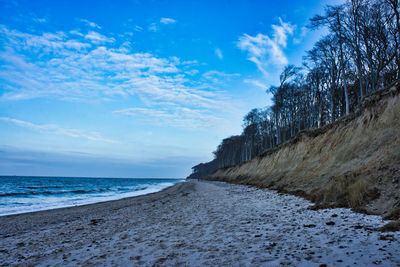 Scenic view of sea against sky during winter