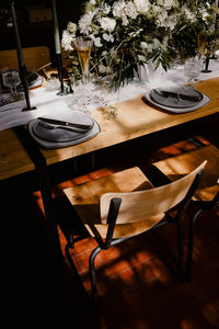 High angle view of chairs and table in restaurant