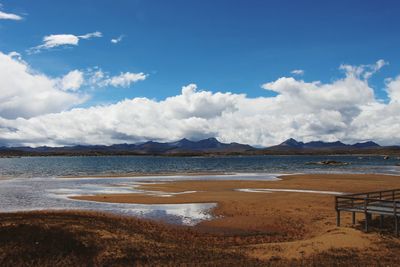 Scenic view of beach against sky