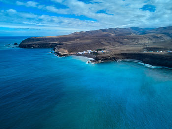 Aerial view of the atlantic ocean and the coastline in ajuy fuerteventura island drone photography