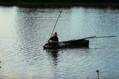 Man fishing in lake