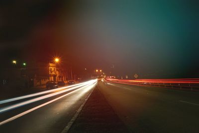 Light trails on road at night