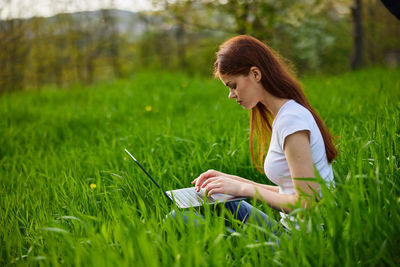 Young woman using mobile phone