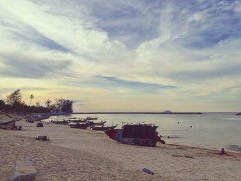 Scenic view of beach against sky during sunset