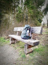 Abandoned bench in field