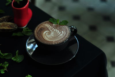 Coffee cup on table