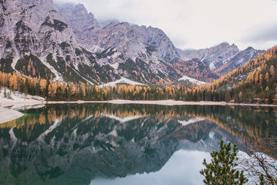 Scenic view of lake and mountains against sky