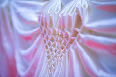 Full frame shot of pink fabric hanging at store