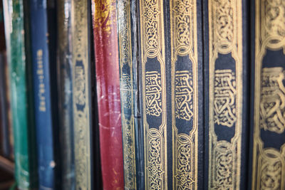 Holy quran on a book shelf. grand mosque, diyarbakir, turkey - june 2021.