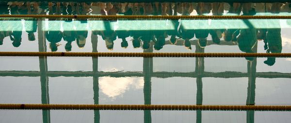 Reflection of swimming pool in lake