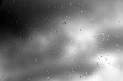 Full frame shot of wet window in rainy season