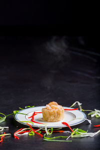 Close-up of breakfast served on table