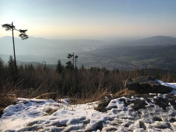 Scenic view of snow field against sky