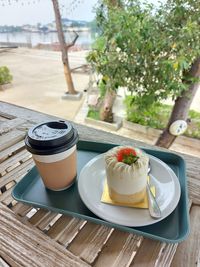 Coffee with cake at a coffee shop by the river in thailand