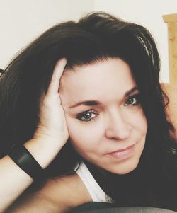 Portrait of beautiful woman at home