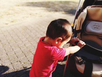 High angle view of boy in car