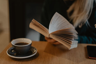 Close-up of coffee cup on table