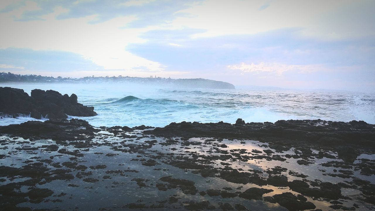 sea, water, horizon over water, sky, beach, scenics, tranquil scene, tranquility, beauty in nature, shore, nature, rock - object, cloud - sky, idyllic, coastline, outdoors, cloud, remote, sunlight, calm