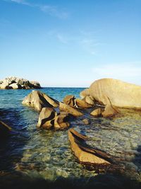 Panoramic view of sea against blue sky