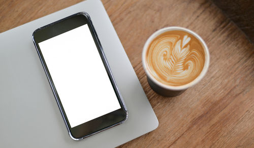 Coffee cup on table