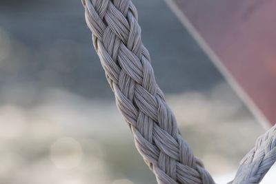 Close-up of rope tied to metal