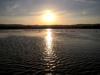 Scenic view of sunset over sea