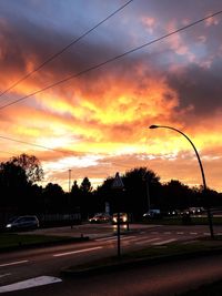 Road against dramatic sky during sunset