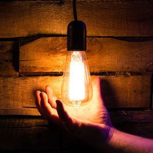 Close-up of illuminated light bulb