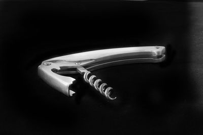 High angle view of piano on table against black background