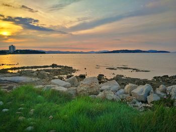 Scenic view of sea against sky during sunset