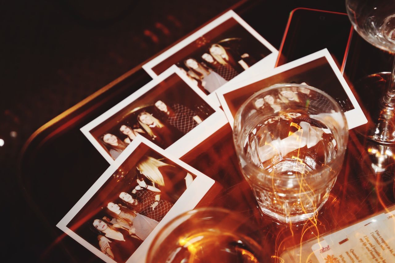 indoors, table, food and drink, drink, drinking glass, glass - material, still life, alcohol, refreshment, wineglass, restaurant, transparent, close-up, illuminated, wine, freshness, glass, no people, wine glass, night