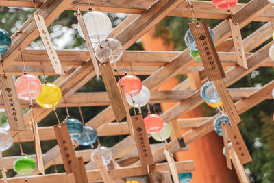 Low angle view of lanterns hanging on ceiling