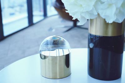 Close-up of glass vase on table