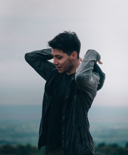 Young man looking at camera