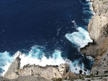 High angle view of blue sea against sky