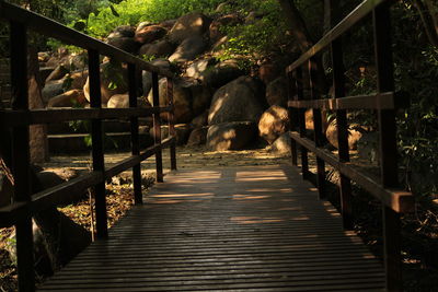 Wooden steel or iron footbridge in forest