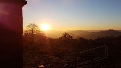 Scenic view of landscape against sky during sunset